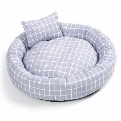 枕ドーナツCuddler猫犬が付いている卸し売り円形の柔らかく暖かいペット ベッドはスリップの底が付いているペット ベッドの贅沢を非寝かせる
