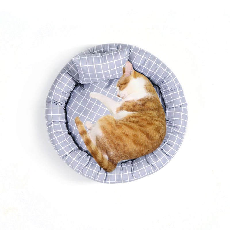 枕ドーナツCuddler猫犬が付いている卸し売り円形の柔らかく暖かいペット ベッドはスリップの底が付いているペット ベッドの贅沢を非寝かせる